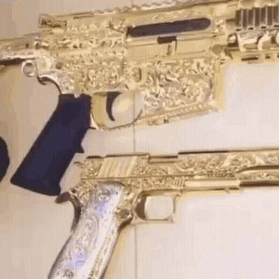 Two Gold Guns GIF