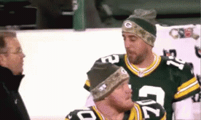 Two Green Bay Packers Players Talking To Man GIF
