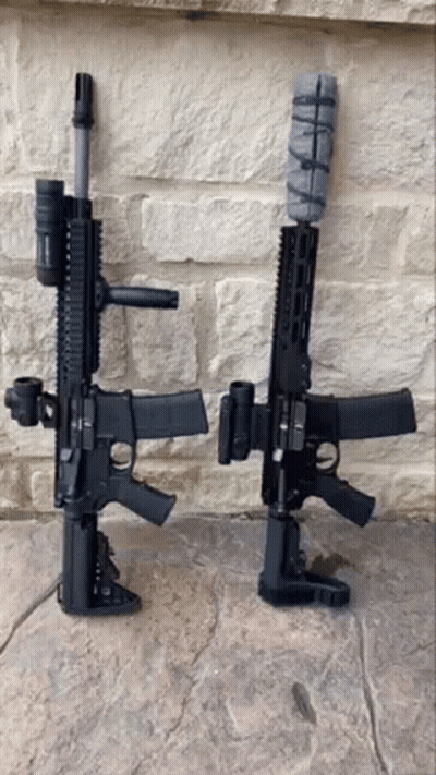 Two Guns Sitting On Stone Floor GIF