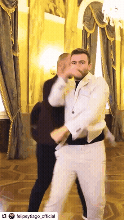 Two Guys Dancing Bachata Styling GIF