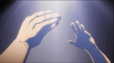 Two Hands Are Reaching Out Towards Each Other In The Dark GIF