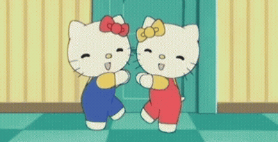 Two Hello Kitty Characters Dancing Together GIF