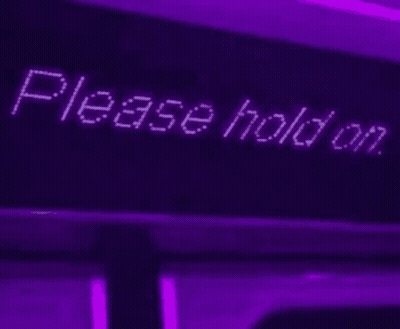 Two Hello Kitty Necklaces On Purple Background GIF