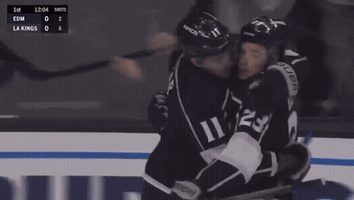 Two Hockey Players Hugging During LA Kings Vs Edmonton Game GIF