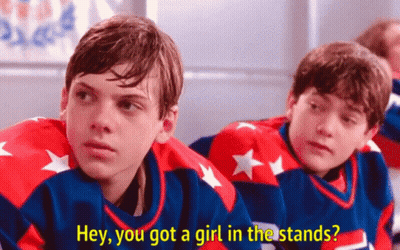 Two Hockey Players One Says Hey You Got a Girl in the Stands