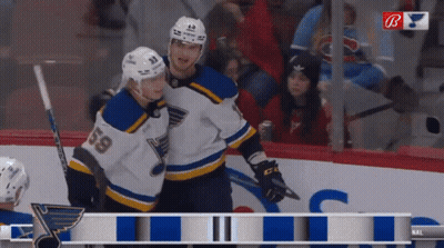 Two Hockey Players One With Number 8 GIF