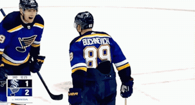 Two Hockey Players One With Number 89 GIF