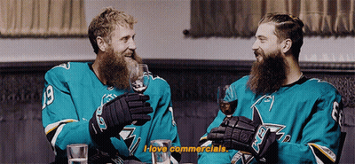 Two Hockey Players Wine Saying I Love Commercials GIF