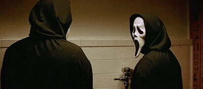 Two Hooded Men In Masks In Bathroom GIF