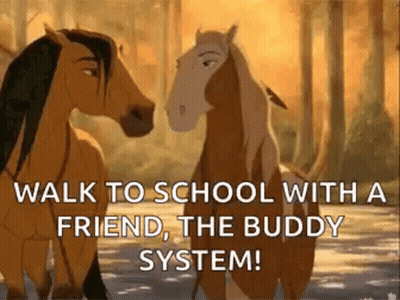Two Horses Are Standing Next To Each Other In The Woods And Talking . GIF
