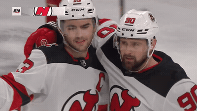 Two Ice Hockey Players Posing In CCM Helmets GIF