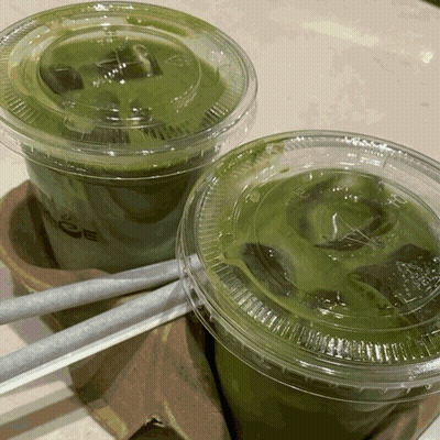 Two Iced Green Teas With Straws GIF