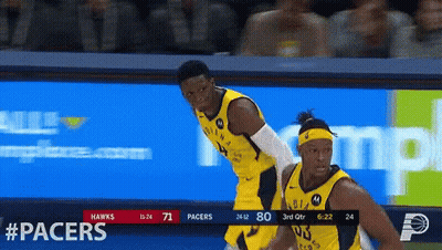 Two Indiana Pacers Basketball Players On A Court GIF