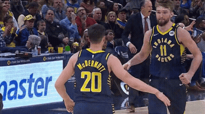 Two Indiana Pacers Players Standing On Court GIF