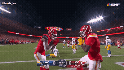 Two KC Football Players Celebrating Touchdown GIF