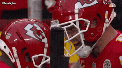 Two KC Football Players Looking At Each Other GIF