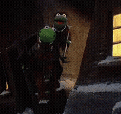 Two Kermit The Frogs Are Walking Down A Dark Street GIF