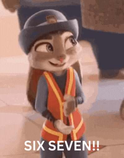 Two Kittens Wearing Paper Hats In Classroom GIF