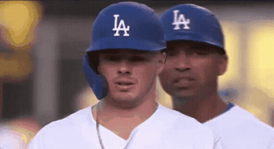 Two LA Dodgers Baseball Players Standing Together GIF