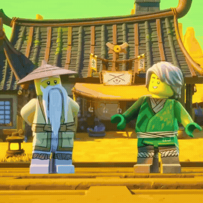 Two Lego Figures In Front Of Building With Chinese Writing GIF