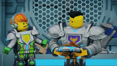 Two Lego Figures One With Bull Shield GIF