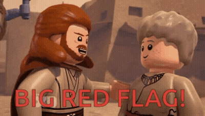 Two Lego Figures Side By Side Big Red Flag GIF