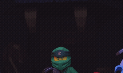 Two Lego Ninjas Standing In The Dark GIF