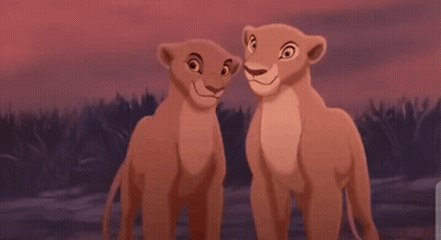 Two Lion King Cubs Smiling At Each Other GIF