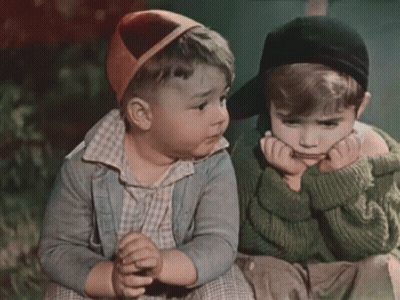 Two Little Boys Sitting With Hands On Faces GIF