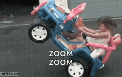 Two Little Girls Are Riding In A Toy Car With The Words Zoom Zoom On The Bottom . GIF