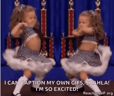 Two Little Girls Dancing In Front Of Trophies And Blue Curtain GIF