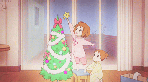 Two Little Girls Decorate A Christmas Tree With A Yellow Star On Top GIF