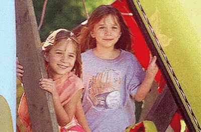 Two Little Girls One Wearing Baseball Shirt GIF