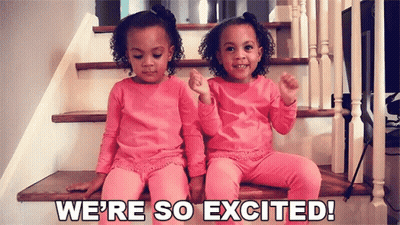 Two Little Girls Sitting On Stairs Saying We're So Excited GIF