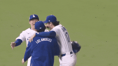 Two Los Angeles Baseball Players Hugging GIF