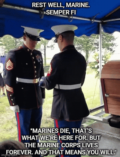 Two Marines Are Standing In Front Of A Coffin With The Caption Rest Well Marine GIF