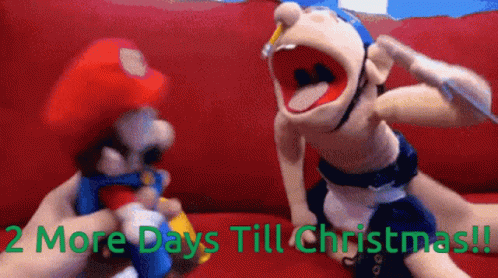 Two Mario Puppets Are Sitting On A Red Couch With The Words " 2 More Days Till Christmas " GIF