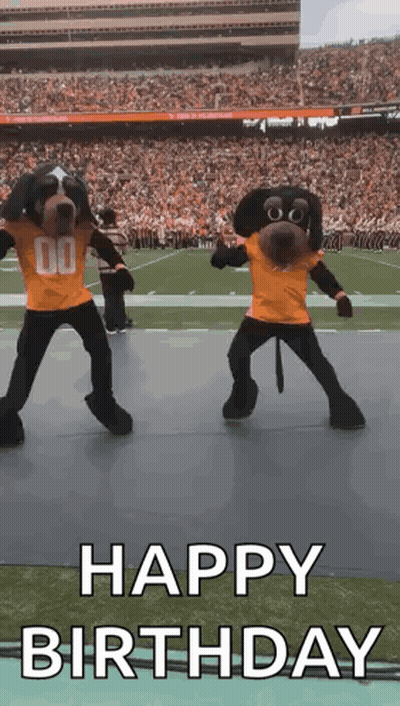 Two Mascots Are Dancing On A Football Field And The Words Happy Birthday Are Written Below Them GIF
