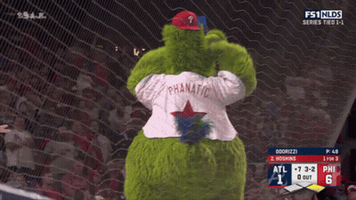 Two Mascots On Baseball Field, One In Phillies GIF