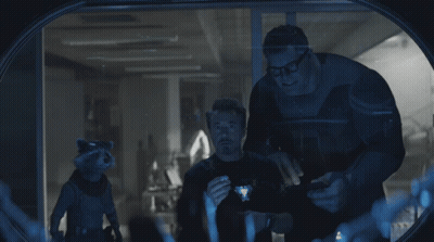 Two Men And A Raccoon Looking Through Window GIF