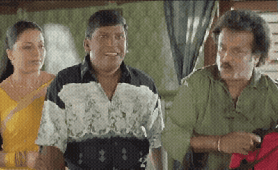 Two Men And A Woman Are Standing Next To Each Other And Talking GIF