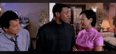 Two Men And A Woman Standing In Living Room GIF