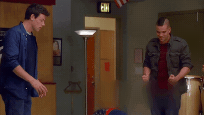 Two Men And Woman In Front Of Exit Sign GIF