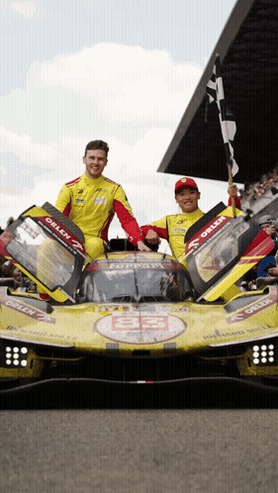 Two Men And Yellow Orlen Race Car GIF