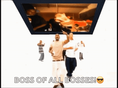 Two Men Are Dancing In Front Of A Screen That Says Boss Of All Bosses ! GIF