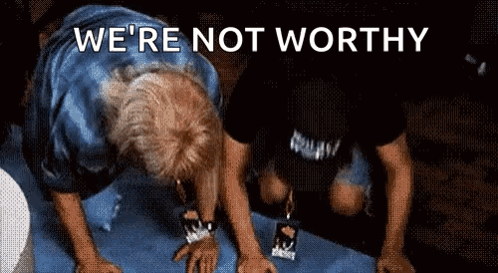 Two Men Are Doing Push Ups With The Words " We 'Re Not Worthy " Behind Them GIF