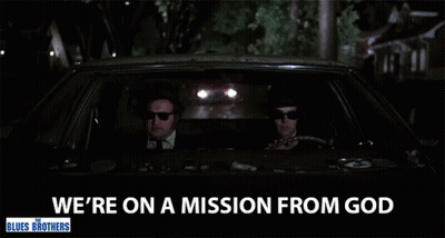 Two Men Are Driving A Car With The Words " We 'Re On A Mission From God " GIF