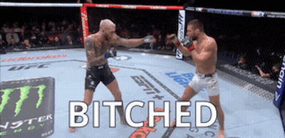 Two Men Are Fighting In A Boxing Ring And The Word Bitches Is On The Screen GIF