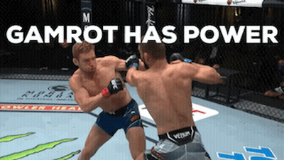 Two Men Are Fighting In A Boxing Ring And The Words Gamrot Has Power Are Above Them GIF
