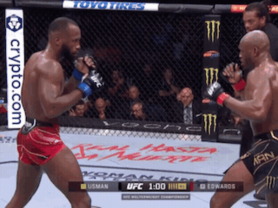 Two Men Are Fighting In A Boxing Ring With A Crypto.com Banner On The Bottom Right GIF